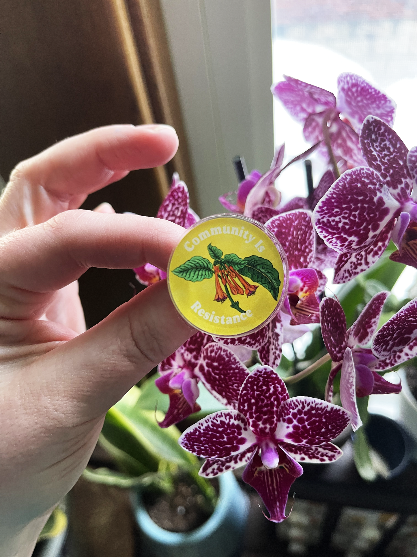 Community Is Resistance: Acrylic Lapel Pin