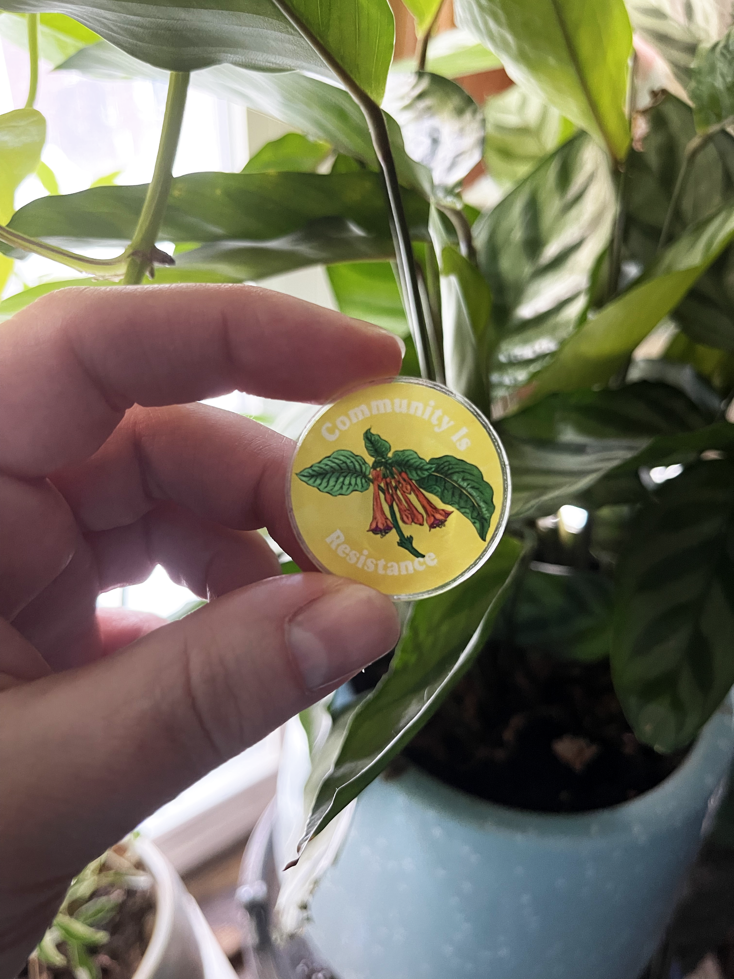 Community Is Resistance: Acrylic Lapel Pin