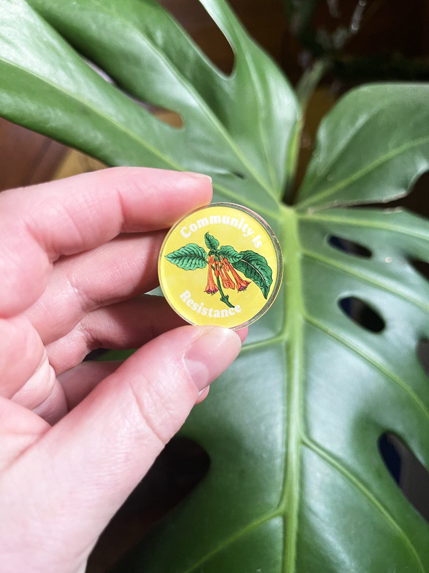 Community Is Resistance: Acrylic Lapel Pin