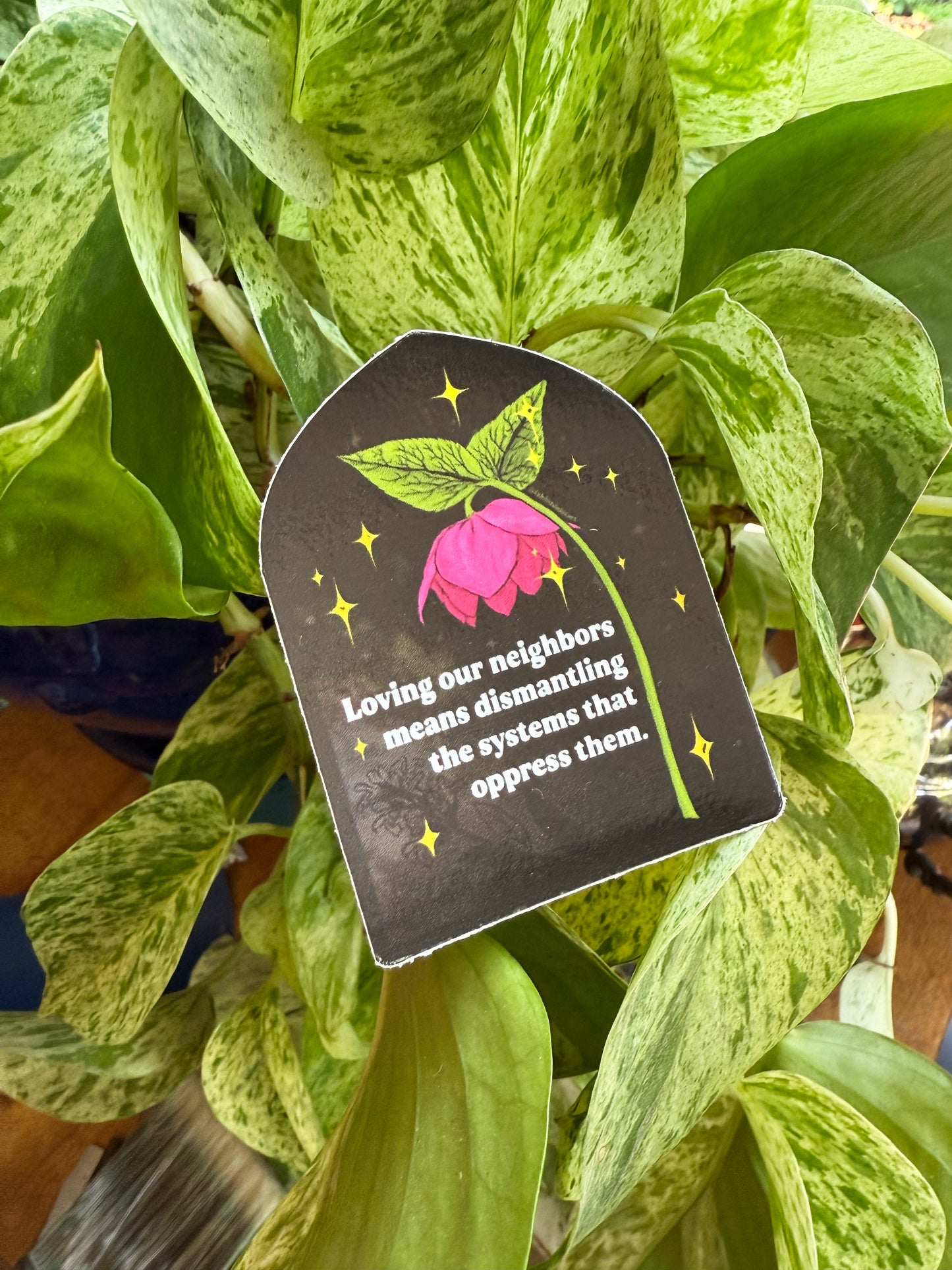 Loving our neighbors means dismantling the systems that oppress them: Feminist Sticker