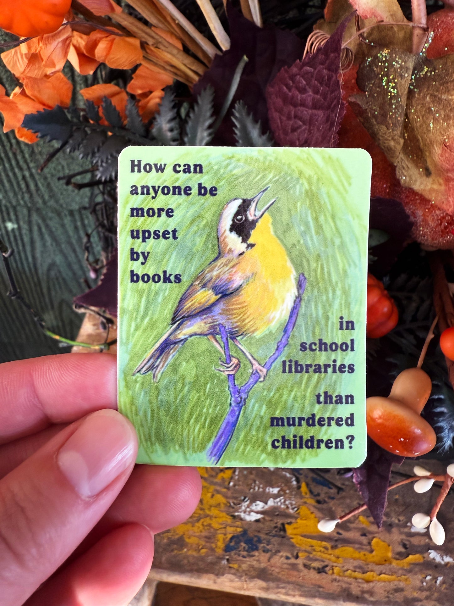 How can anyone be more upset by books in school libraries than murdered children: Feminist sticker