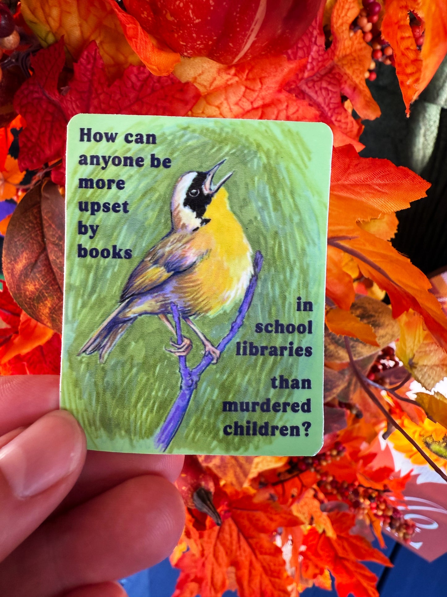 How can anyone be more upset by books in school libraries than murdered children: Feminist sticker