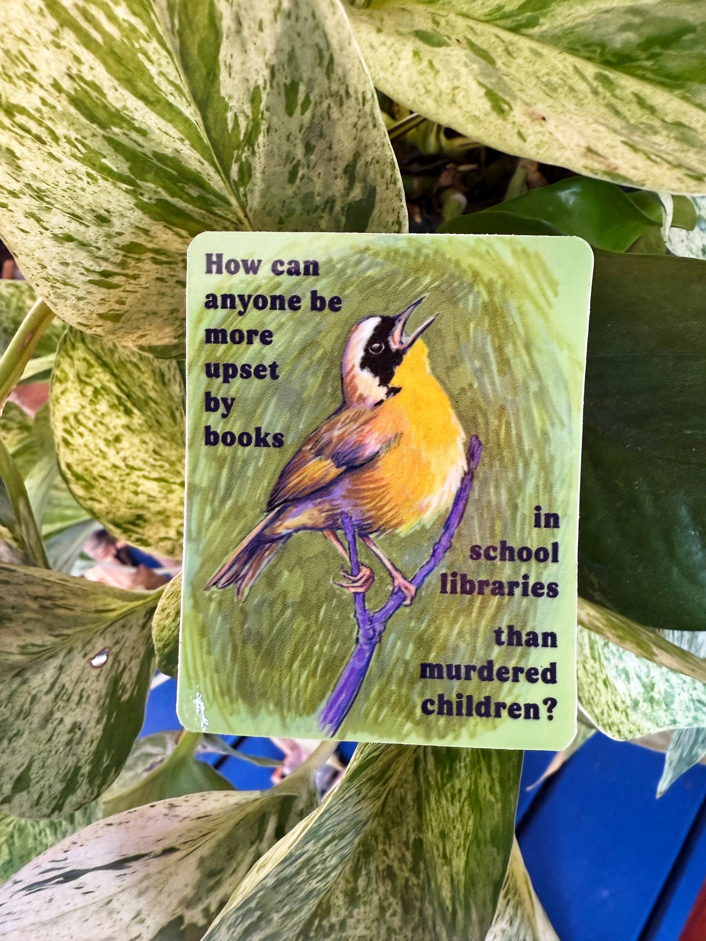 How can anyone be more upset by books in school libraries than murdered children: Feminist sticker