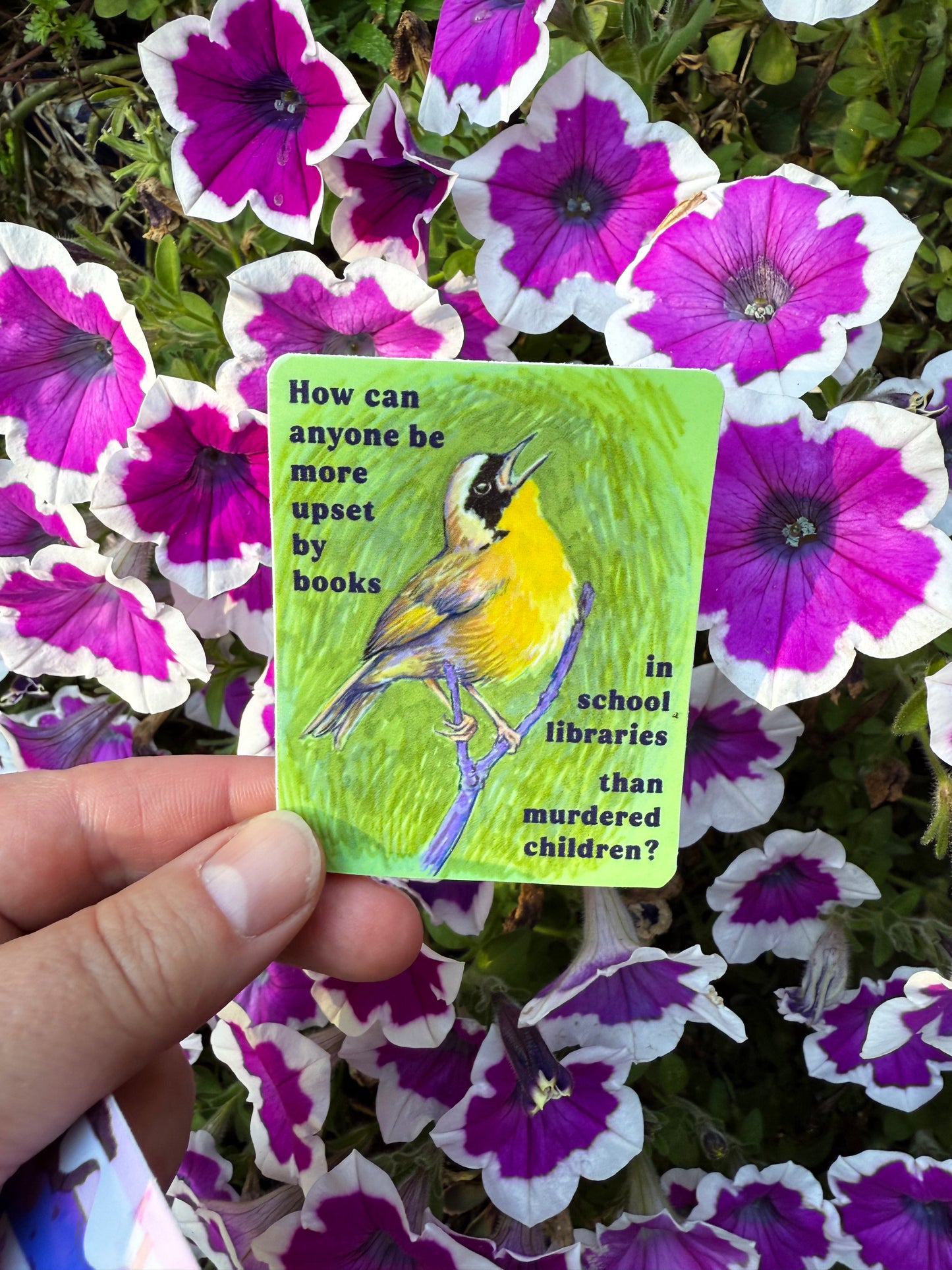 How can anyone be more upset by books in school libraries than murdered children: Feminist sticker