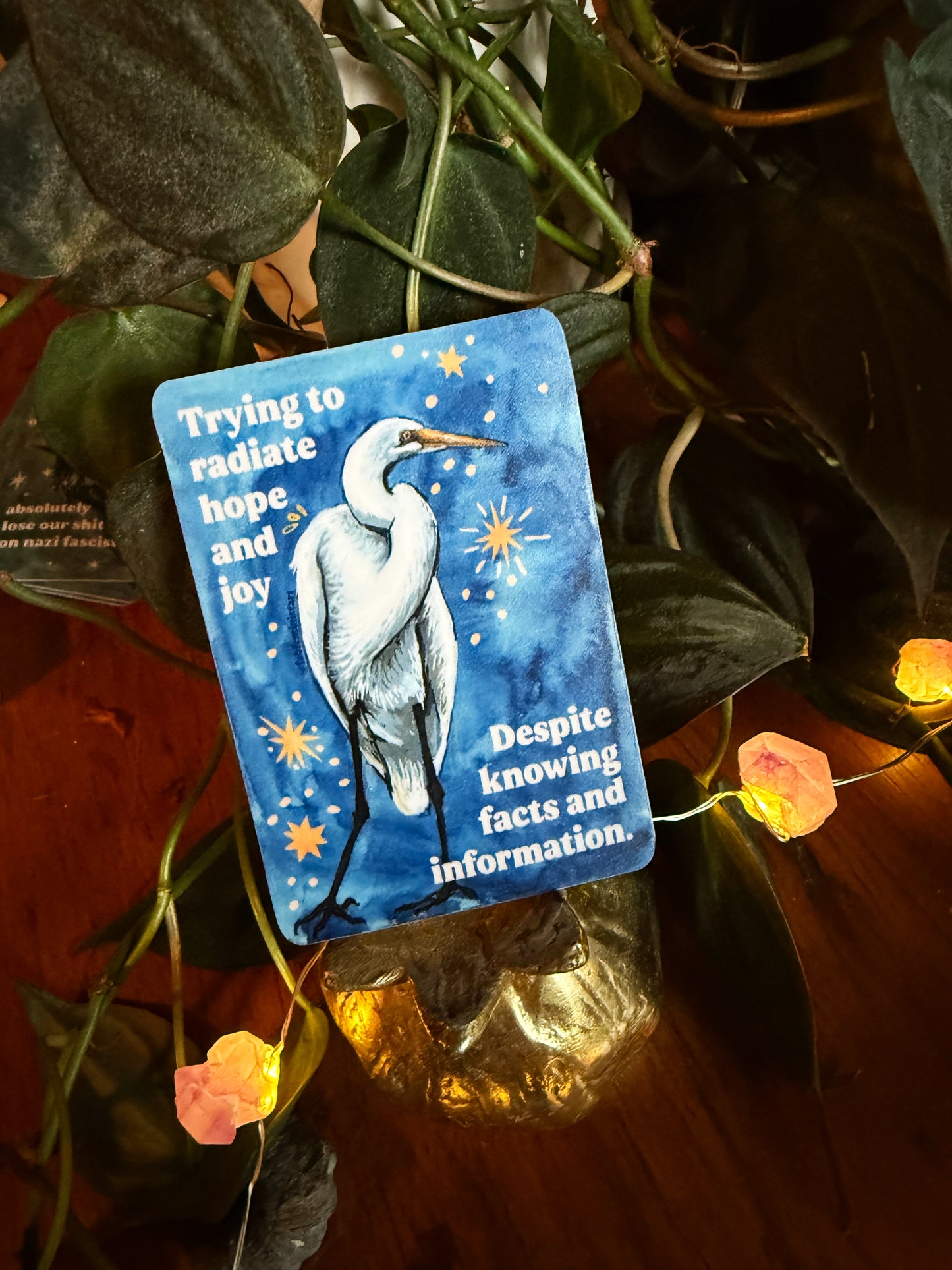 Trying to radiate hope and joy despite knowing facts and information: feminist sticker