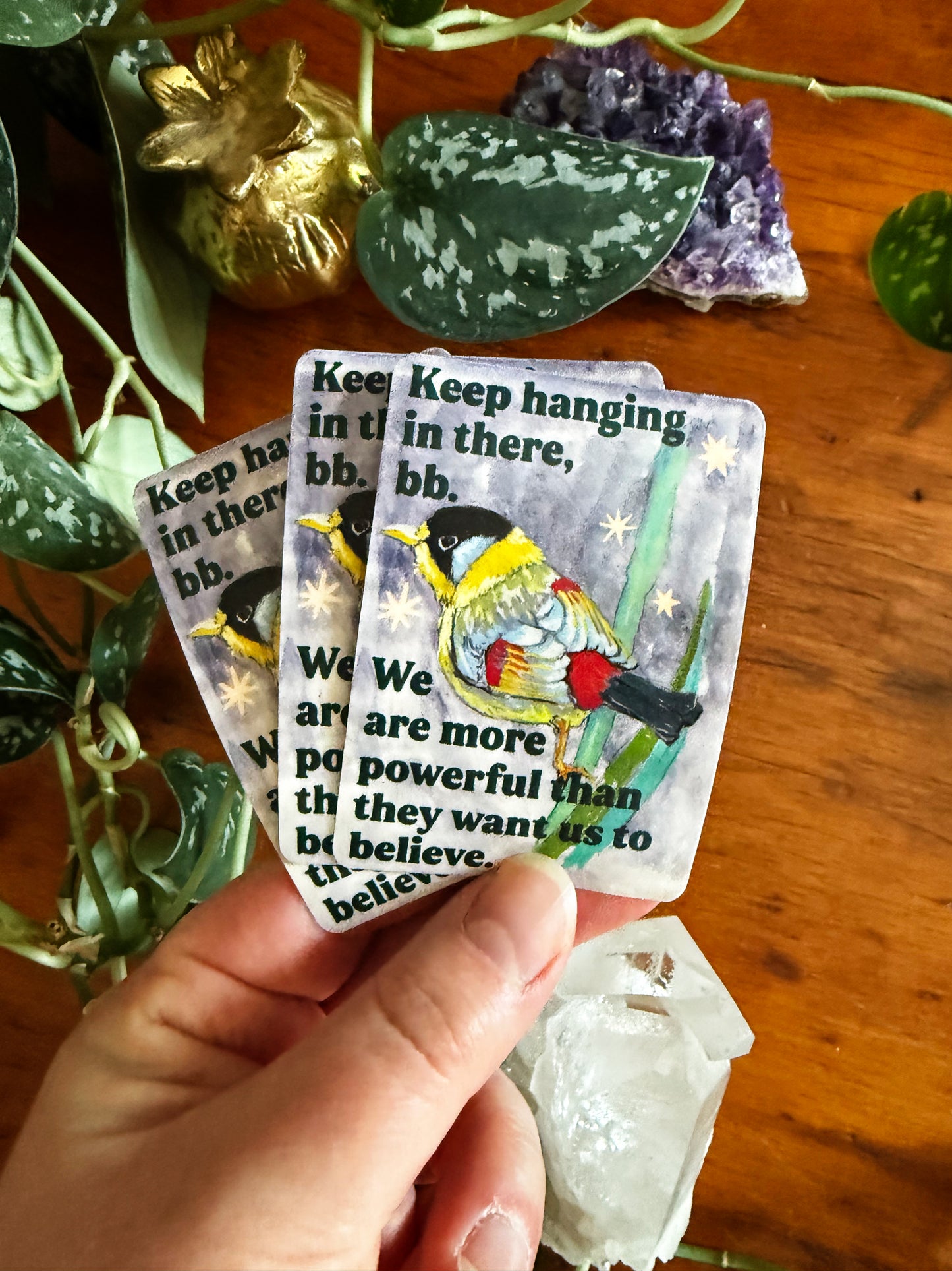 Keep hanging in there, bb. We are more powerful than they want us to believe: feminist sticker