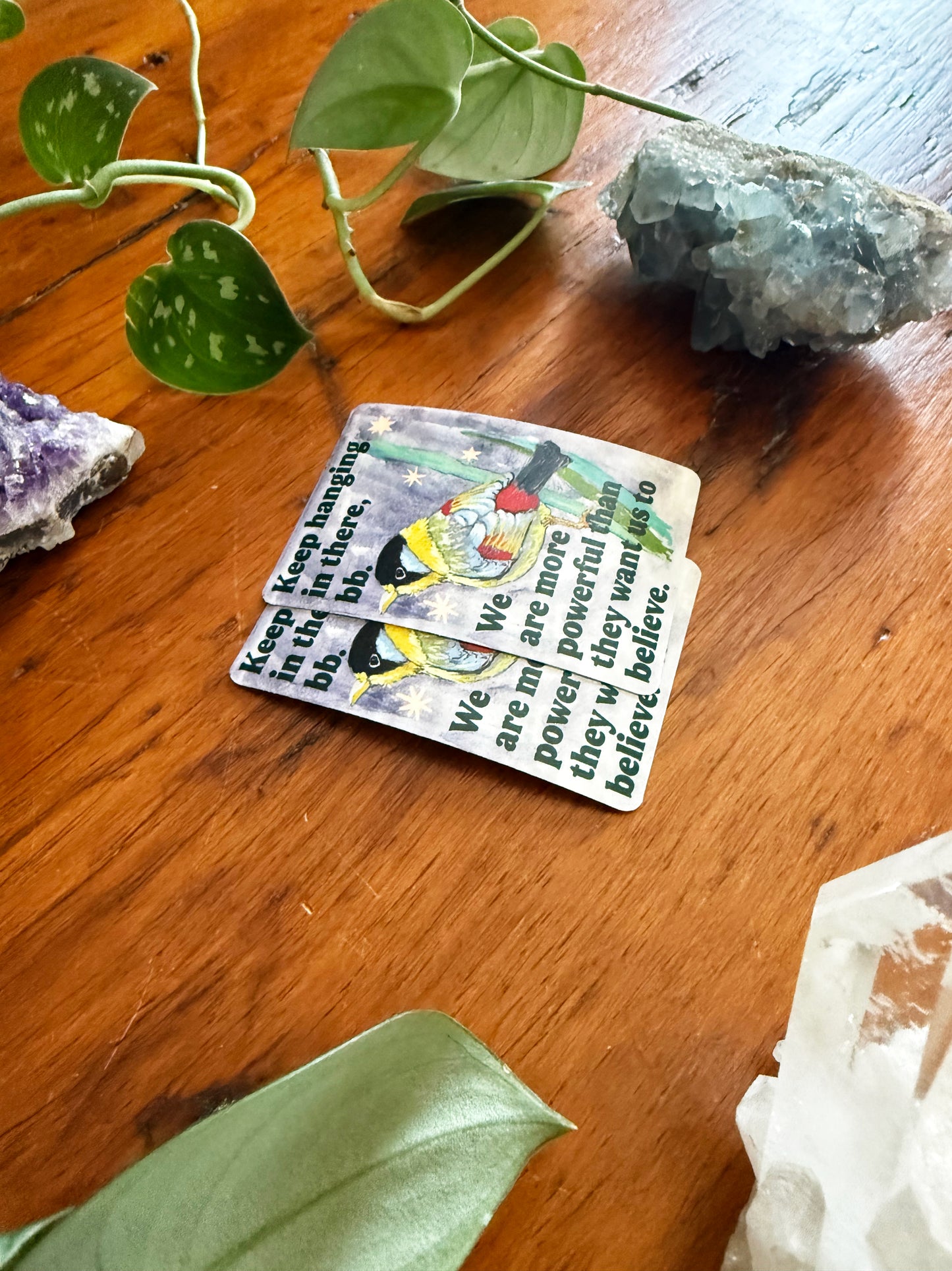 Keep hanging in there, bb. We are more powerful than they want us to believe: feminist sticker