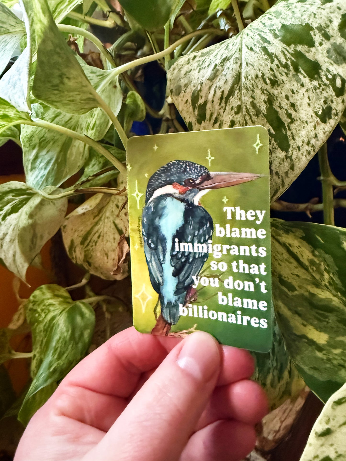 They blame immigrants so you don't blame billionaires: feminist sticker