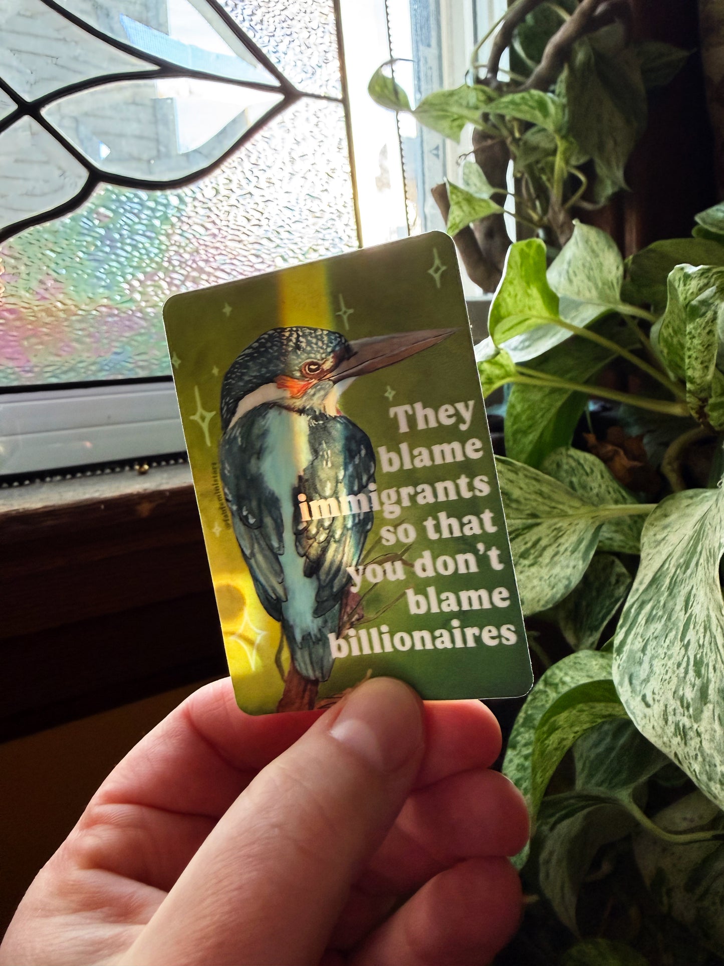 They blame immigrants so you don't blame billionaires: feminist sticker