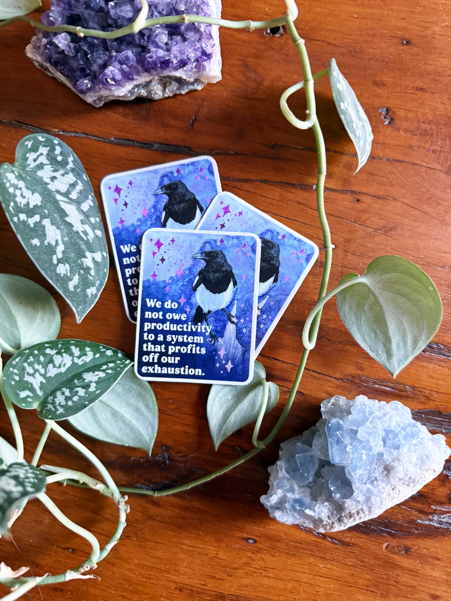 We do not owe productivity to a system that profits off our exhaustion: feminist sticker