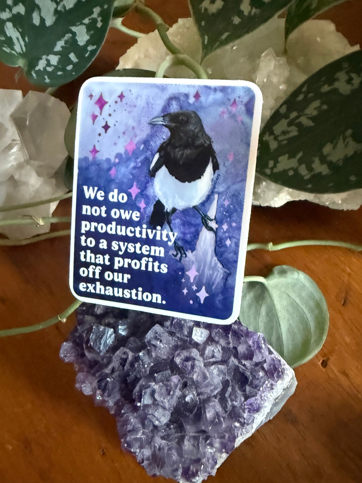 We do not owe productivity to a system that profits off our exhaustion: feminist sticker
