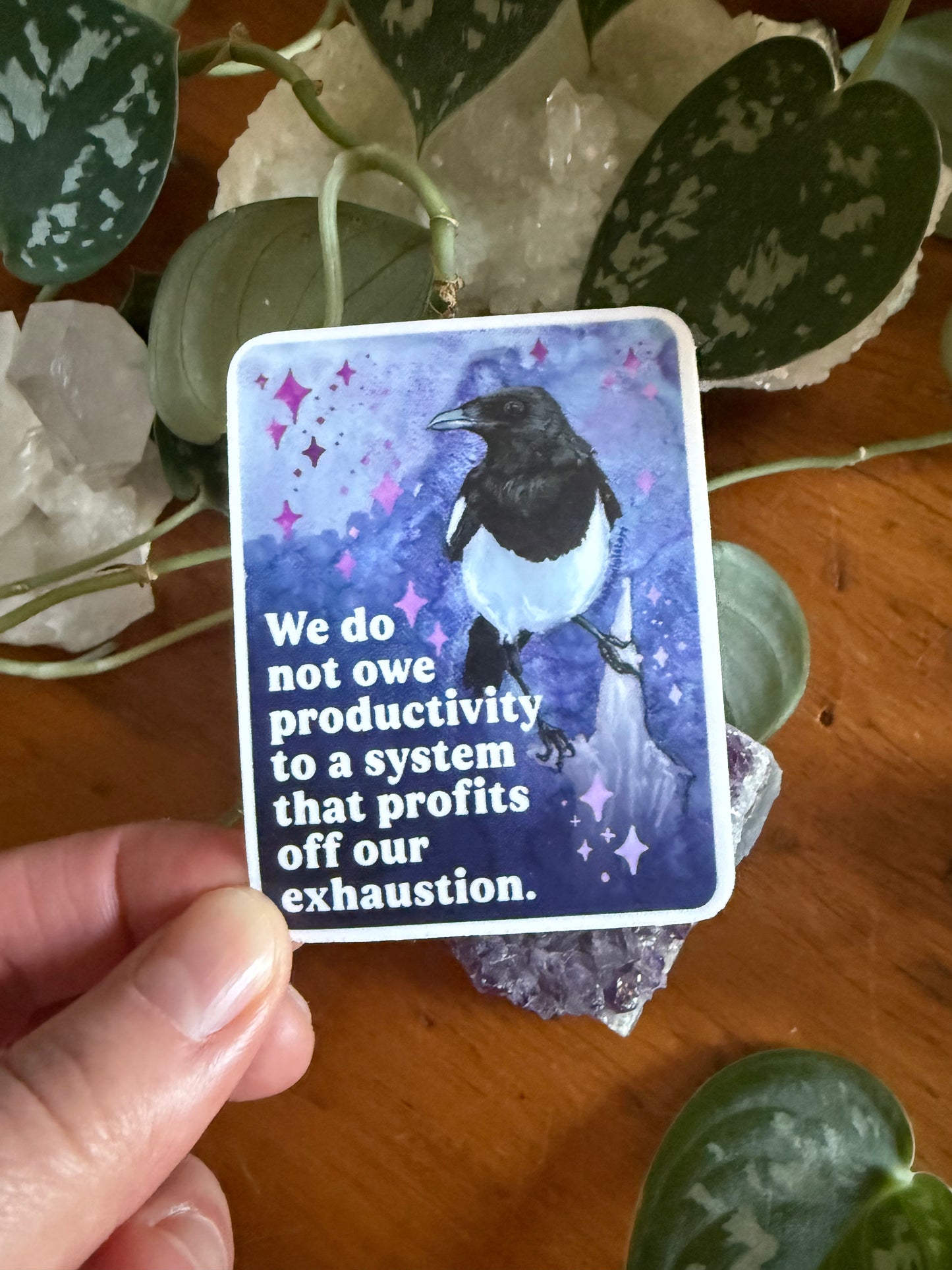 We do not owe productivity to a system that profits off our exhaustion: feminist sticker