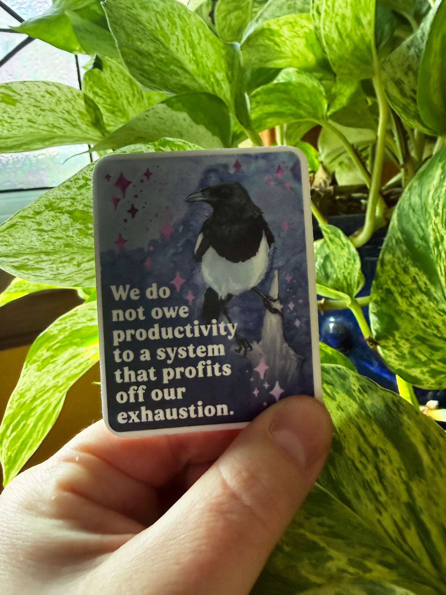We do not owe productivity to a system that profits off our exhaustion: feminist sticker