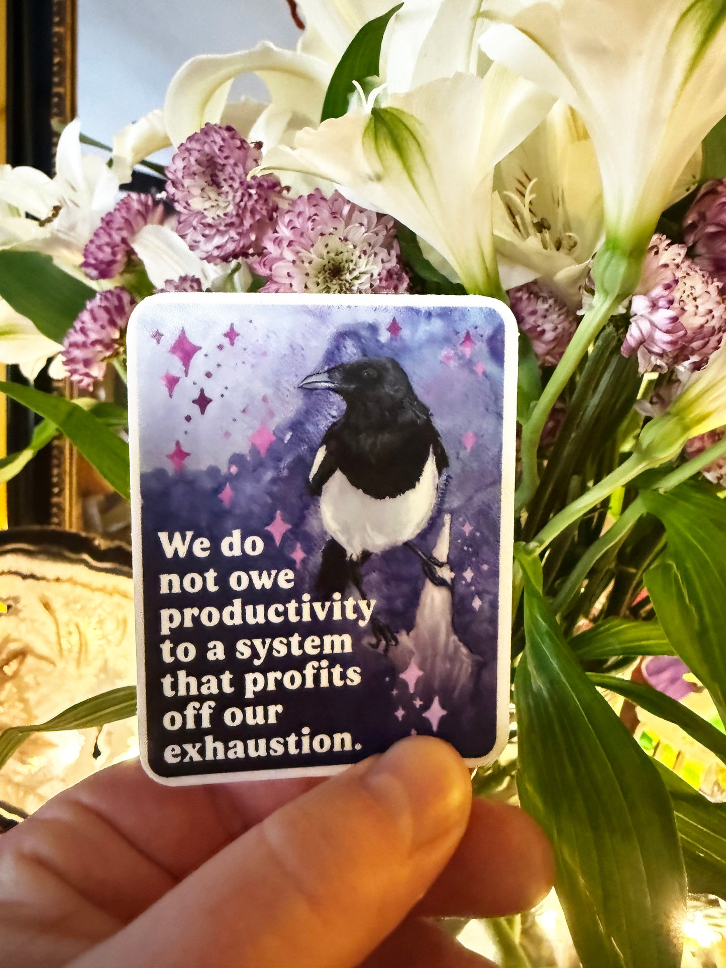 We do not owe productivity to a system that profits off our exhaustion: feminist sticker
