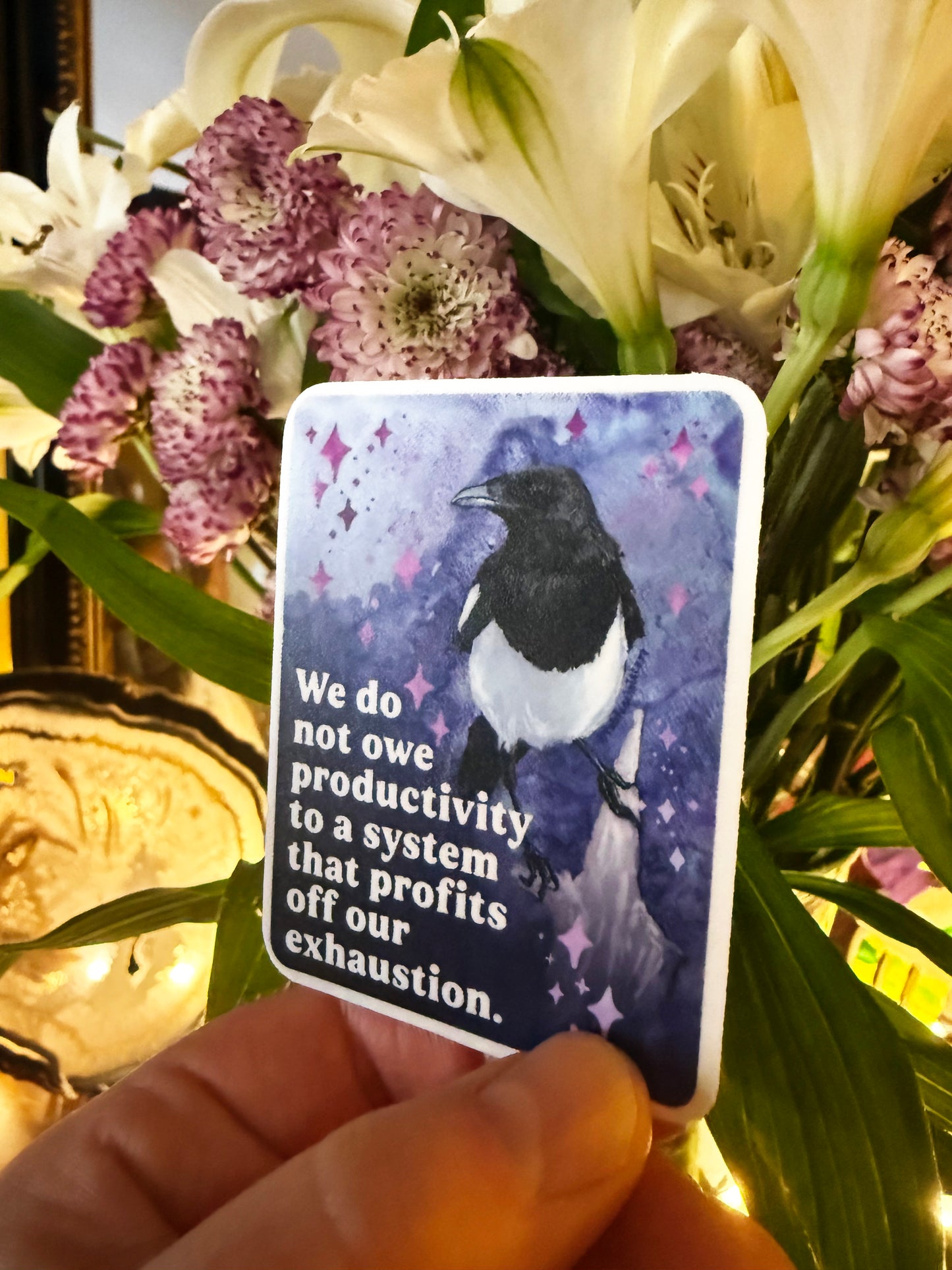 We do not owe productivity to a system that profits off our exhaustion: feminist sticker