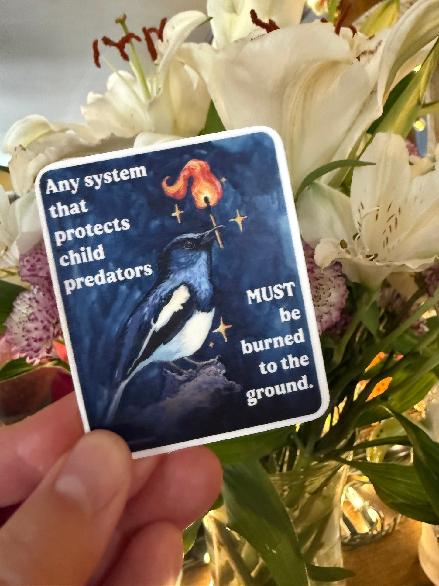 Any system that protects child predators must be burned to the ground: feminist sticker