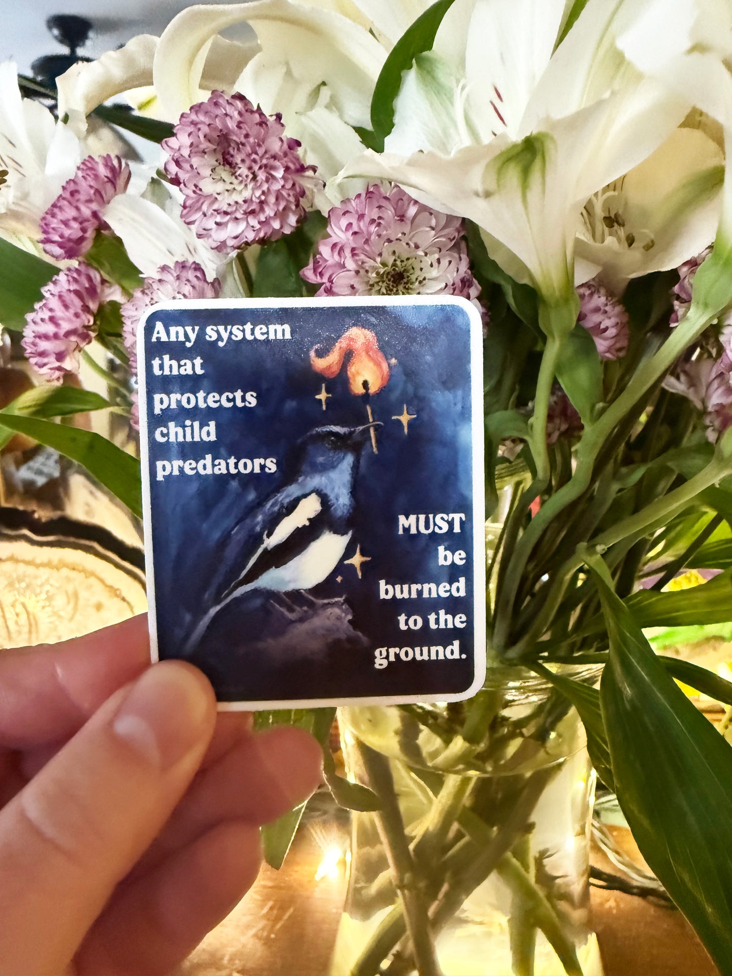 Any system that protects child predators must be burned to the ground: feminist sticker