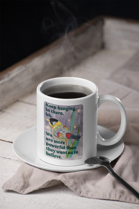 Keep hanging in there, bb. We are more powerful than they want us to believe: feminist mug