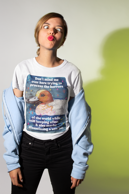 Don't mind me over here trying to process the horrors of the world while still keeping afloat: feminist shirt