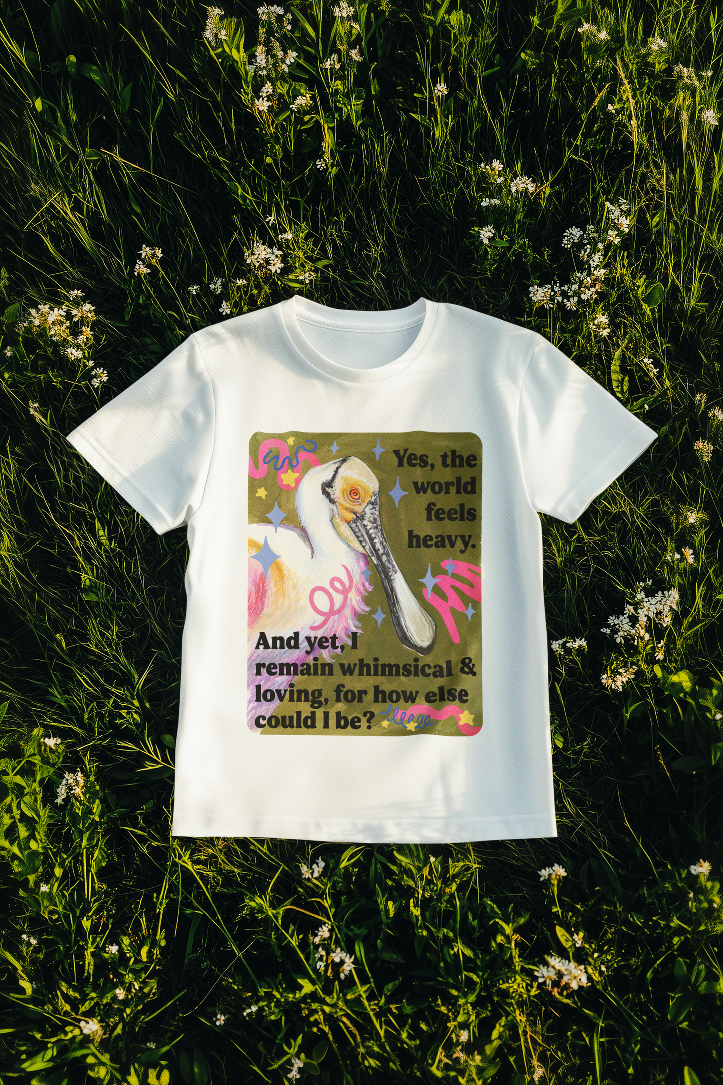 Yes, the world feels heavy. And yet, I remain whimsical & loving, for how else could I be: feminist shirt