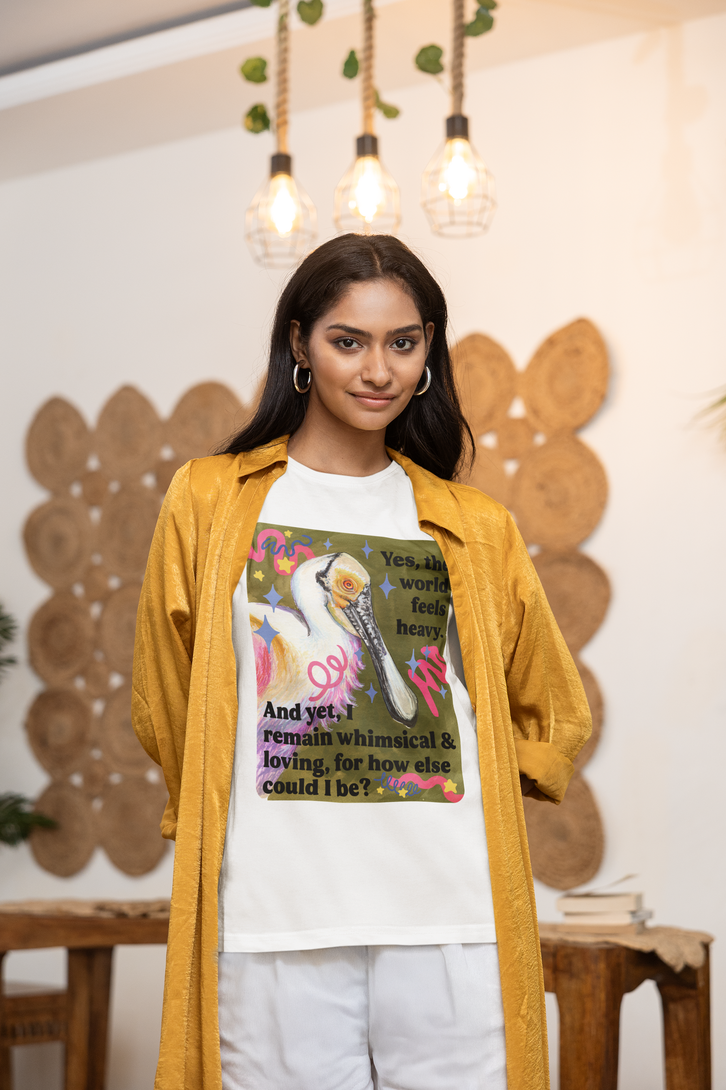 Yes, the world feels heavy. And yet, I remain whimsical & loving, for how else could I be: feminist shirt