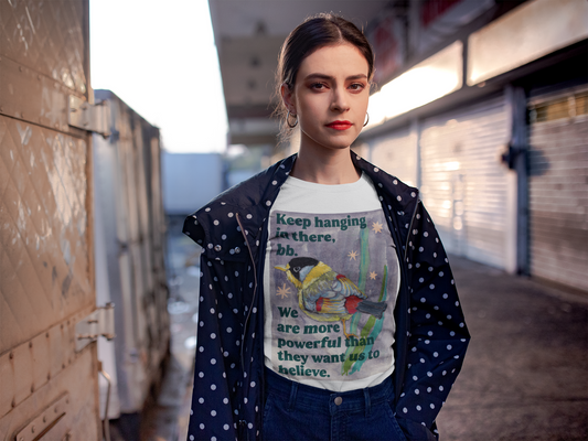 Keep hanging in there, bb. We are more powerful than they want us to believe: feminist shirt